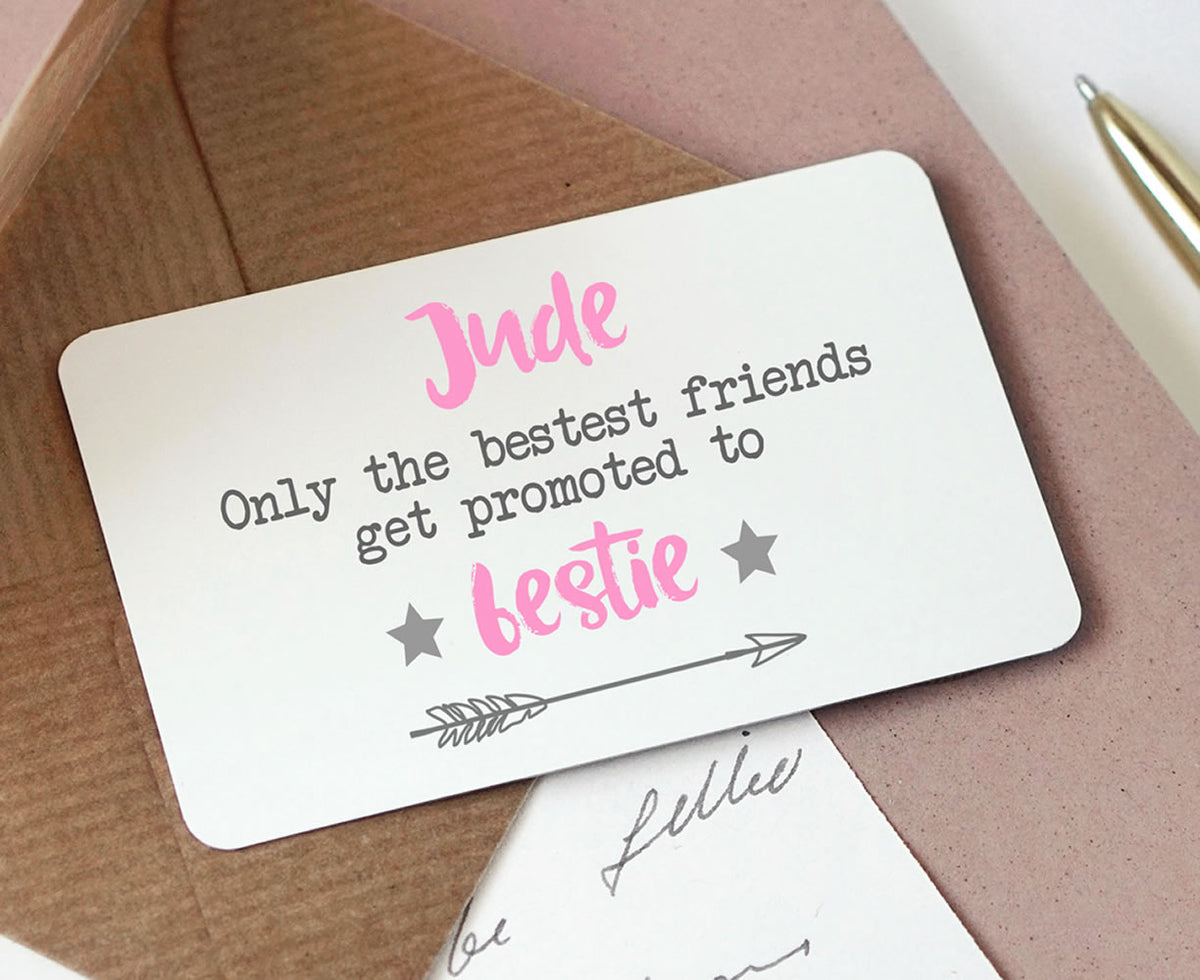 Personalised metal wallet card with 'Only the bestest friends get promoted to bestie' message in pink and grey text